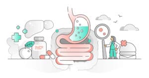 Illustration of a stomach and intestines including doctor and medication